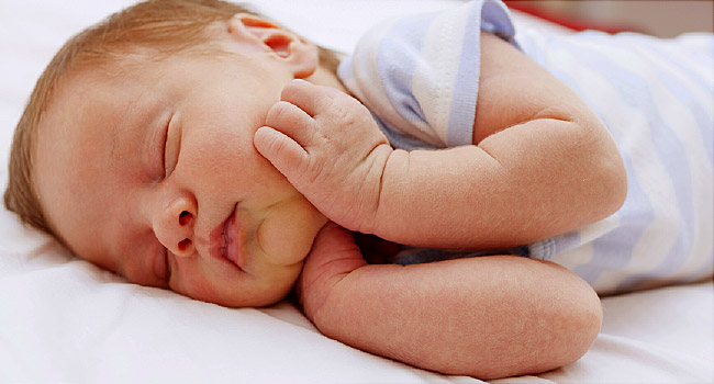 Newborn baby peacefully sleeping